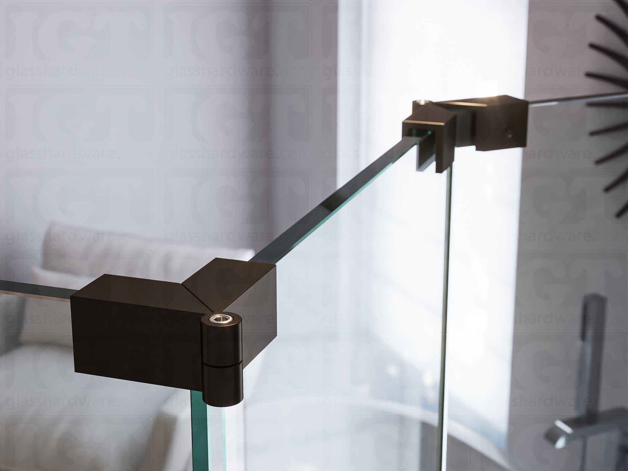 A close up of two Glass-to-Glass Adjustable Sleeve Over Clamps installed on a doorless glass shower enclosure. Oil Rubbed Bronze.