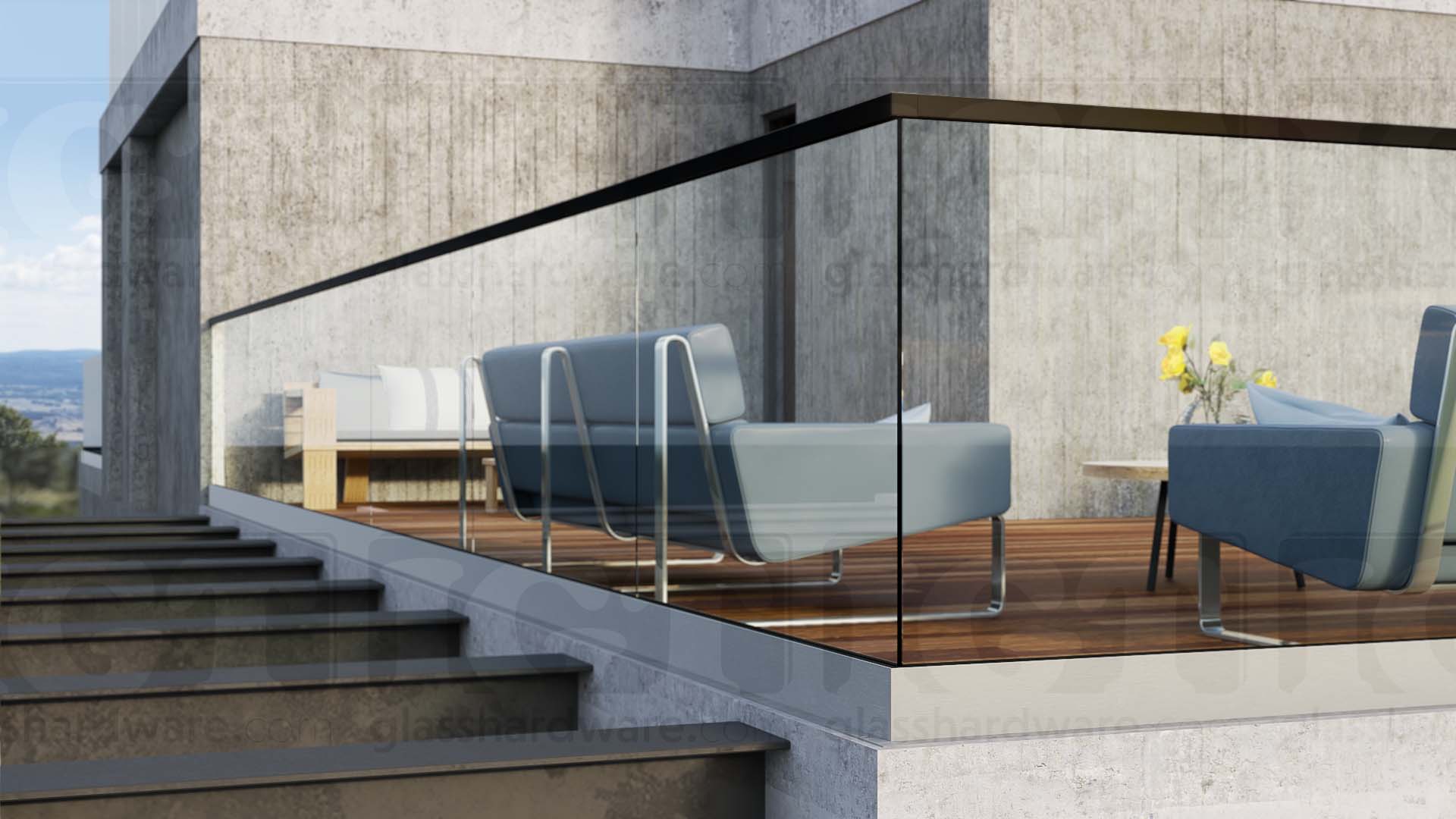 A glass railing system installed on a terrace, featuring the 220" Square Cap Rail, Matte Black.