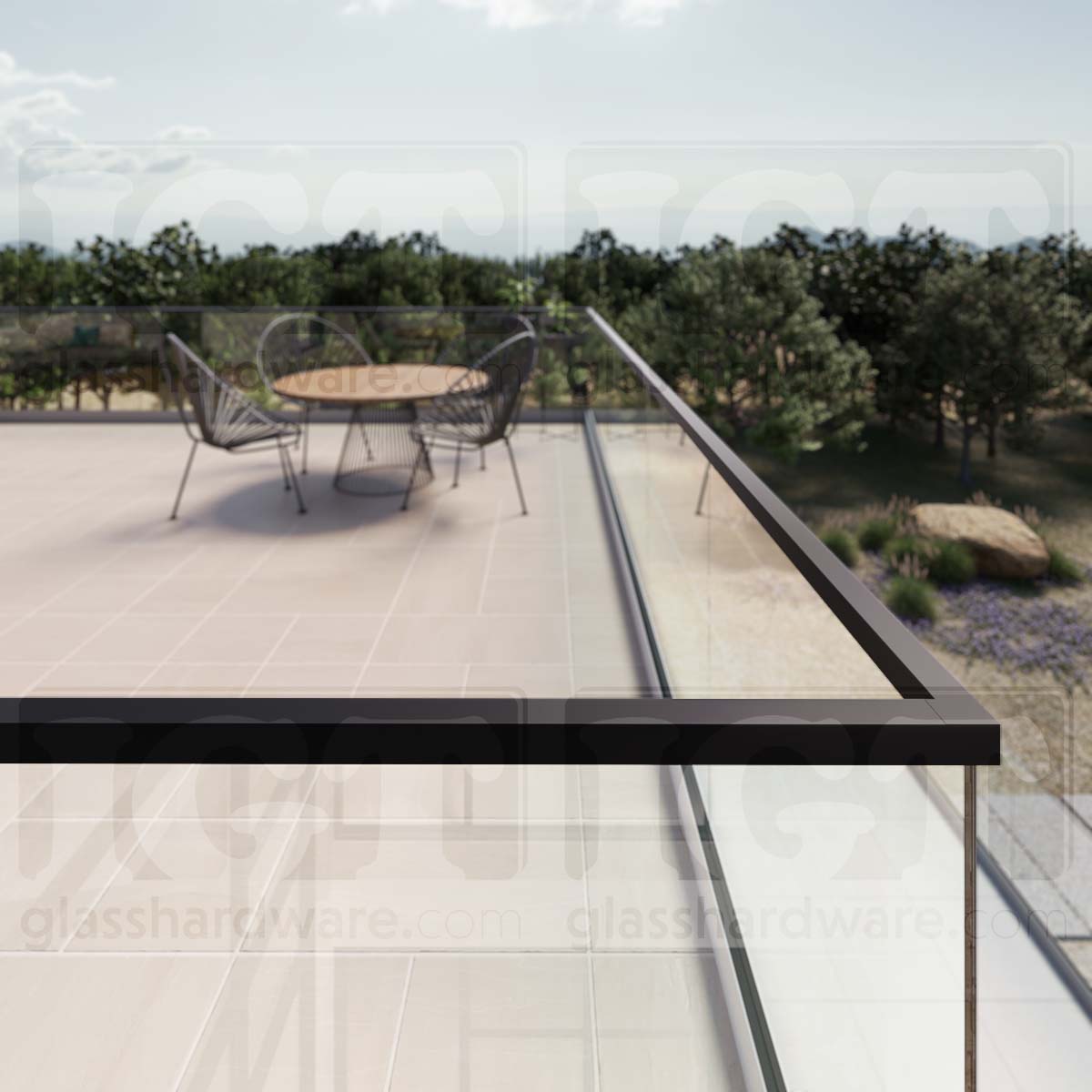 A close-up of a corner joint on a glass railing system, featuring the 220" Square Cap Rail in Matte Black.