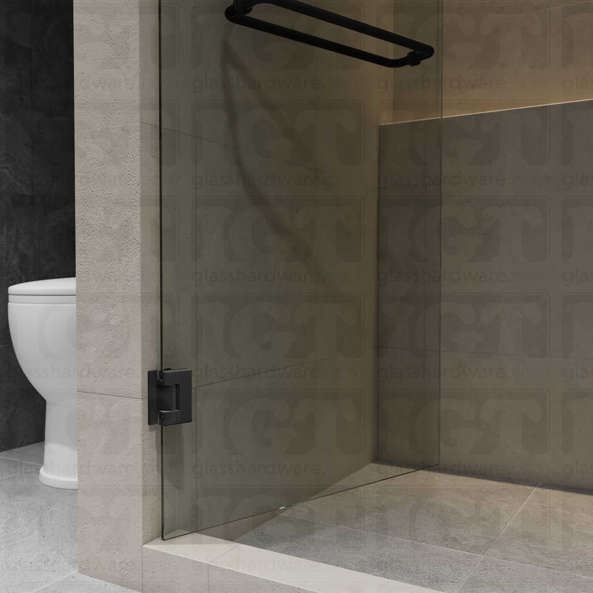 A close-up view of the Wall-to-Glass "H" Back Bilboa Hinge. Matte Black.