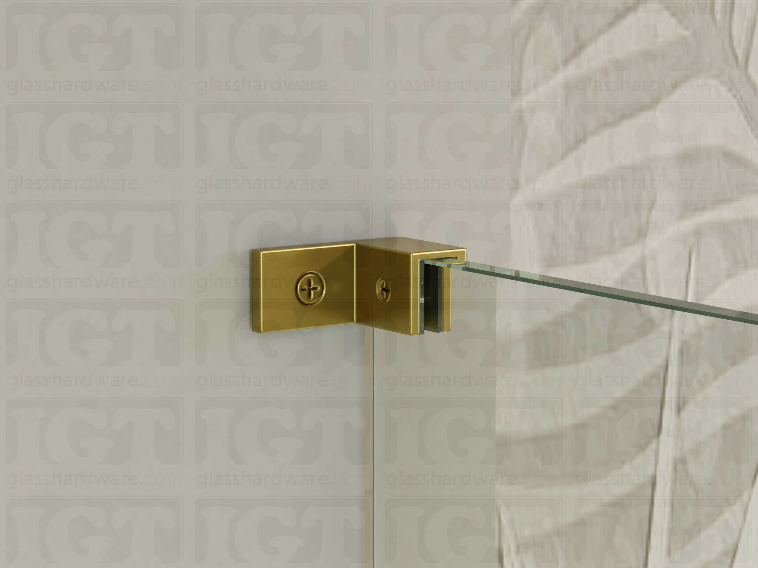 A close up of the Right Wall-to-Glass Sleeve Over Clamp installed on a frameless glass shower enclosure. The clamp is securely mounted to the shower's wall, providing additional support to the overall installation. Gold Brushed.