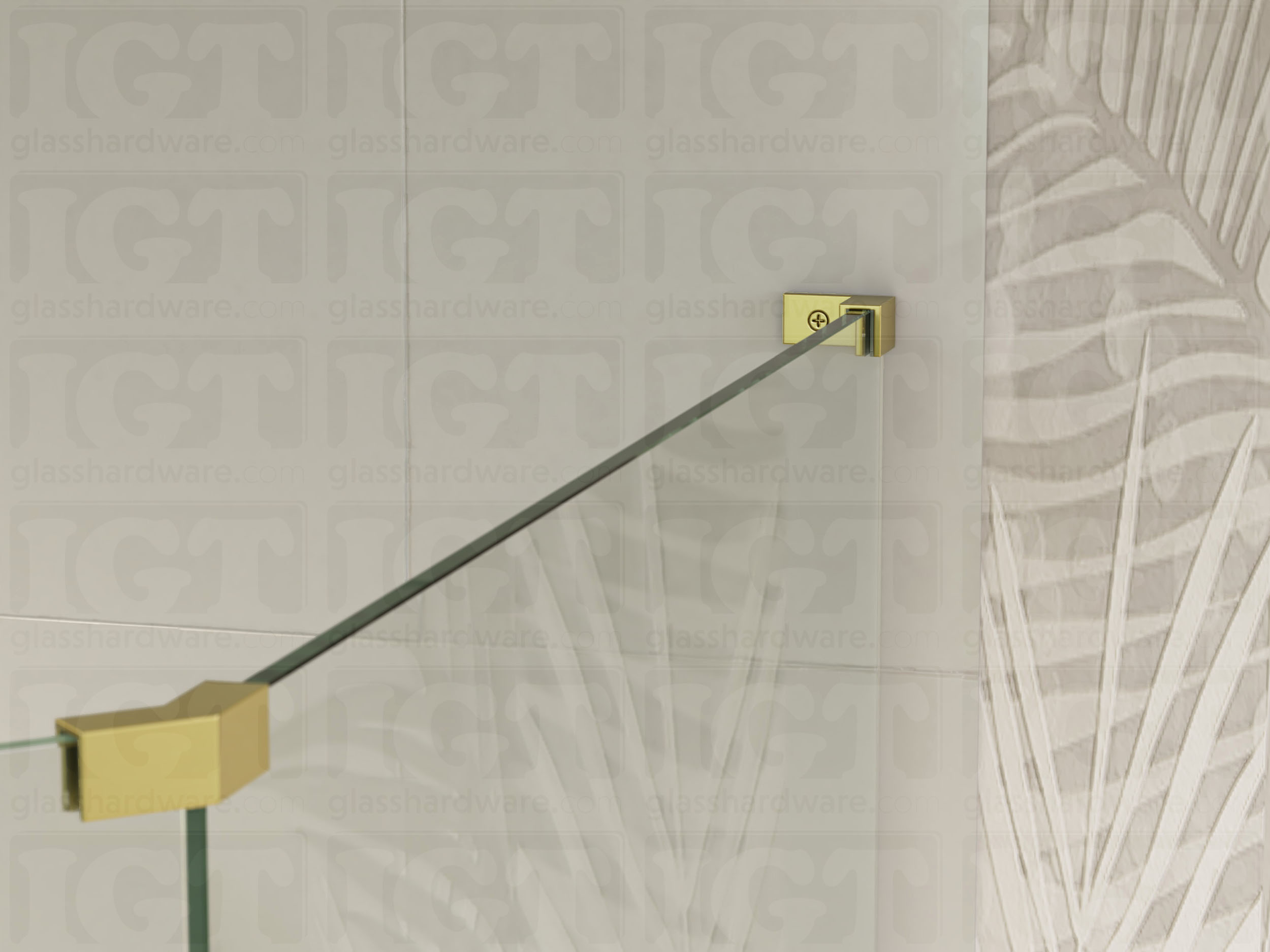 A view of the glass shower enclosure's upper section. The fixed panel is secured to the wall with a Right Wall-to-Glass Sleeve Over Clamp, and joined to an adjacent panel with a glass-to-glass clamp. Gold Brushed.