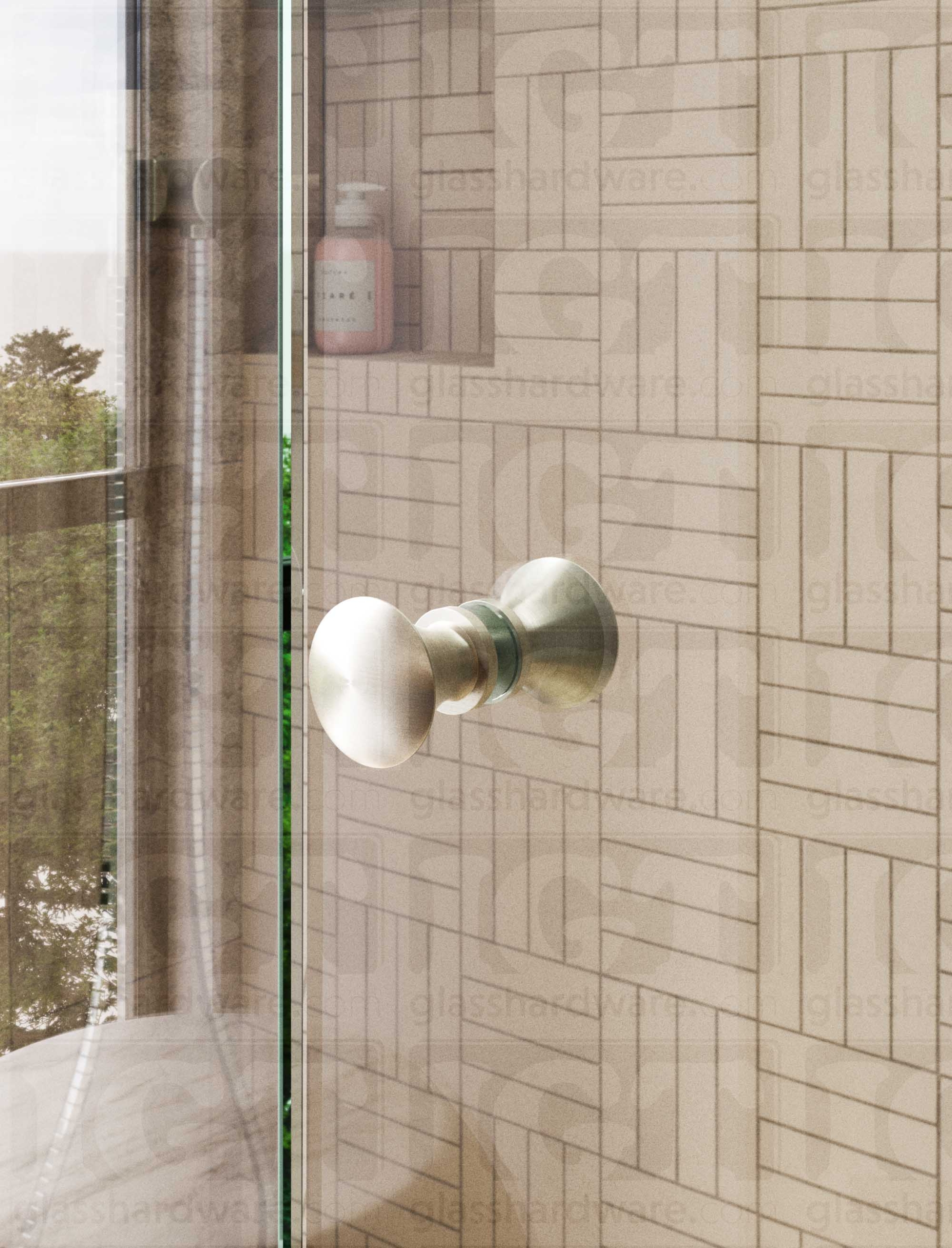 A close up of the Junior Traditional Back-to-Back Door Knob installed on a glass shower door. Brushed Nickel.