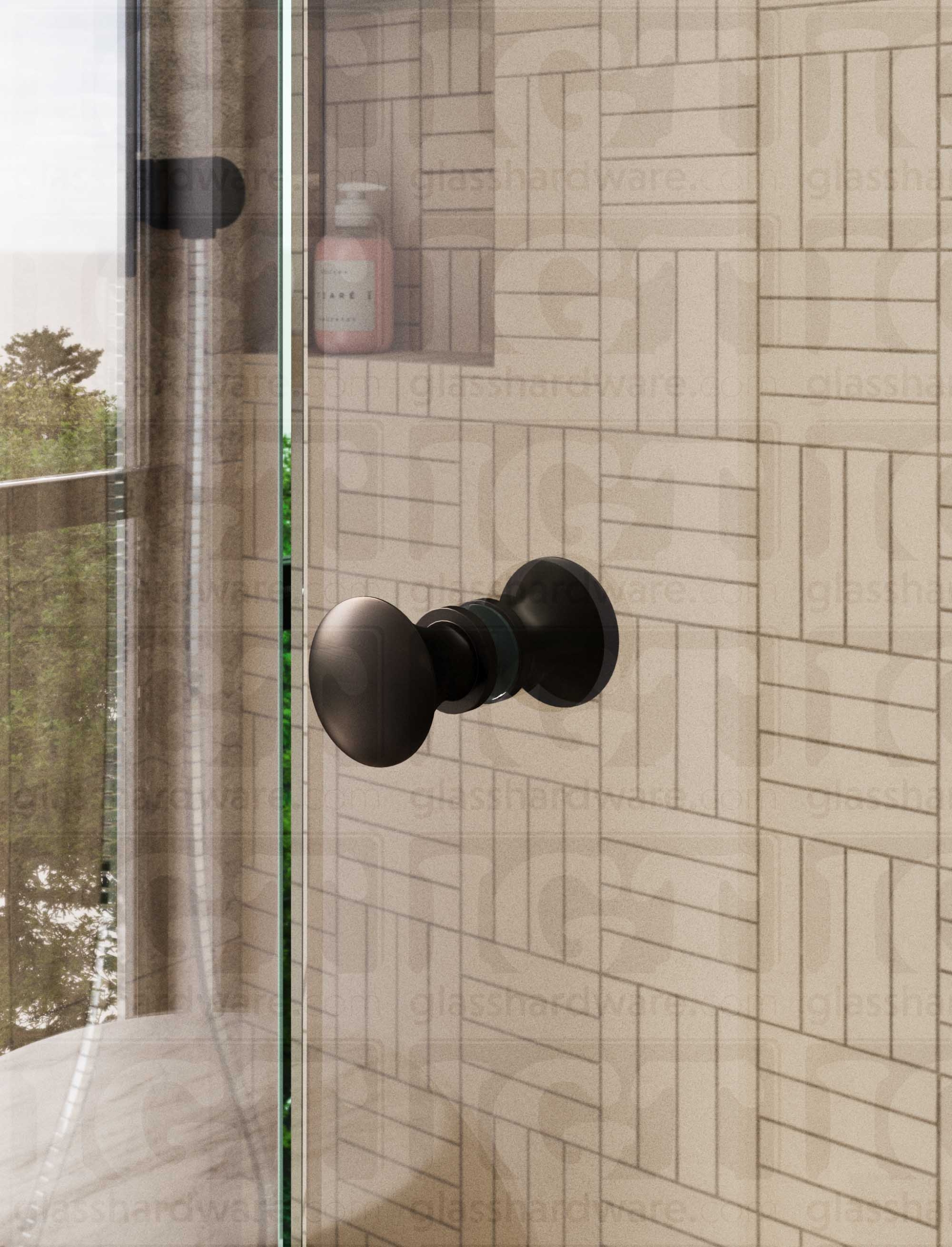 A close up of the Junior Traditional Back-to-Back Door Knob installed on a glass shower door. Oil Rubbed Bronze.