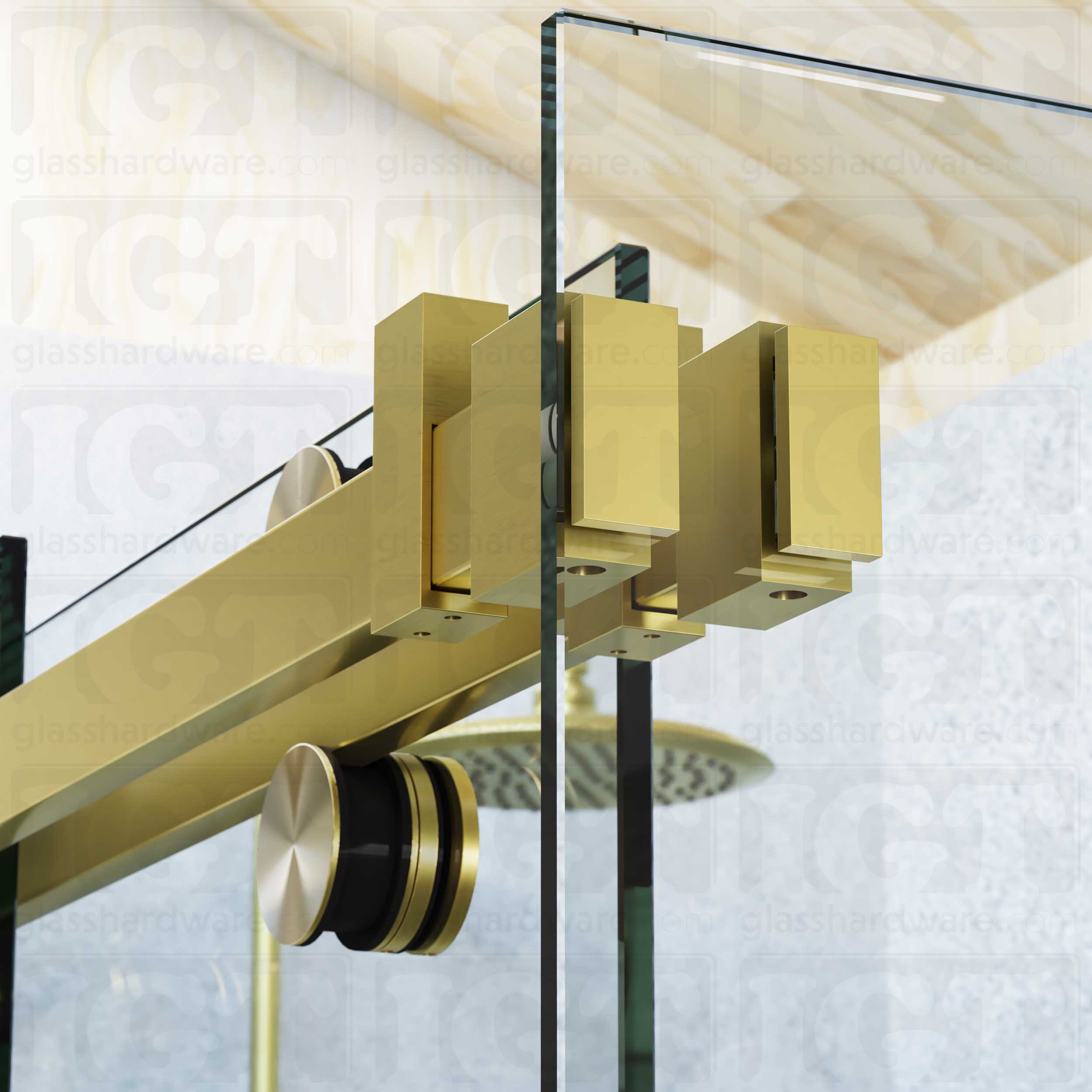 A close up view of the 90 Degree Connectors fixed to the return panel and joined to the sliding door system's track. Gold Brushed.