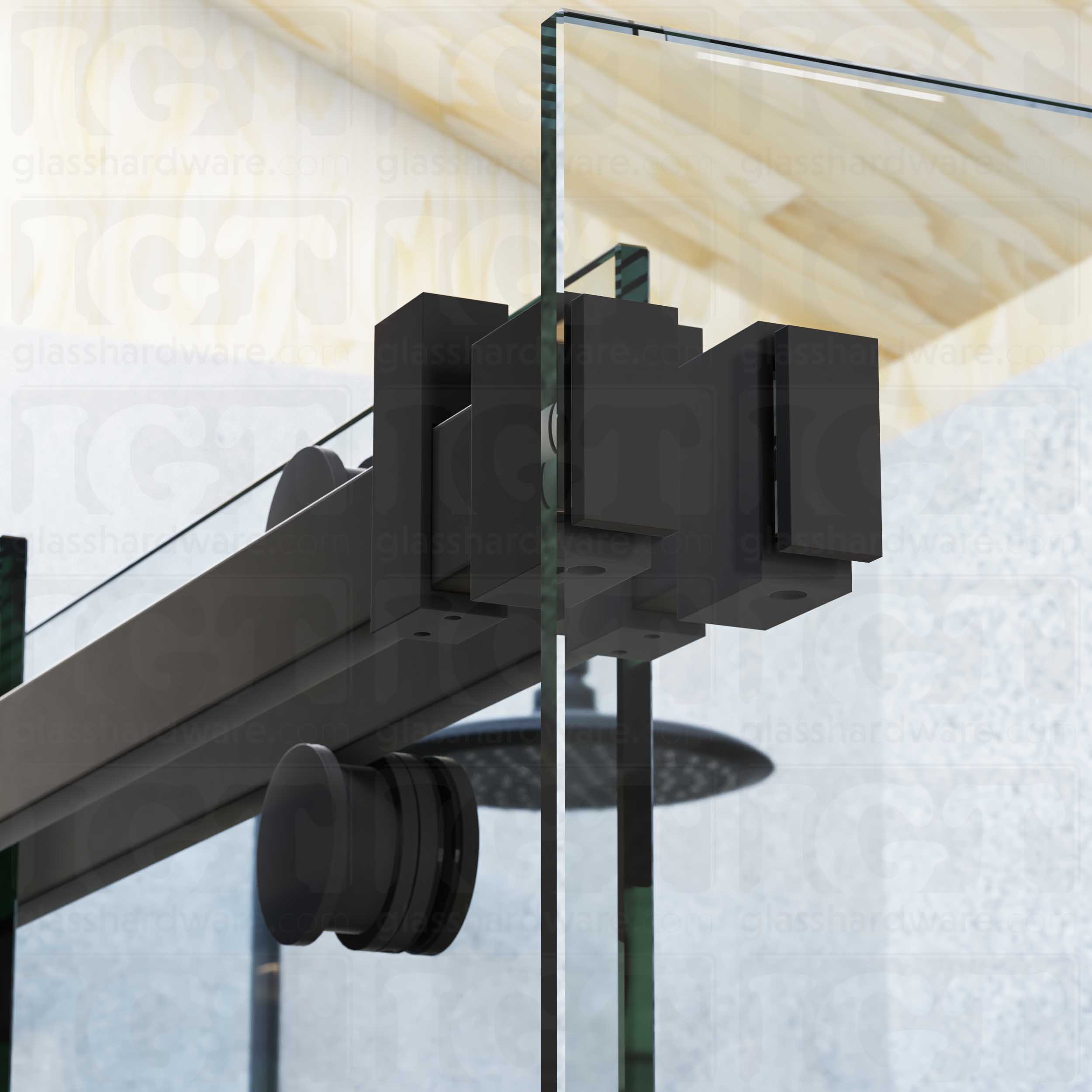 A close up view of the 90 Degree Connectors fixed to the return panel and joined to the sliding door system's track. Matte Black.