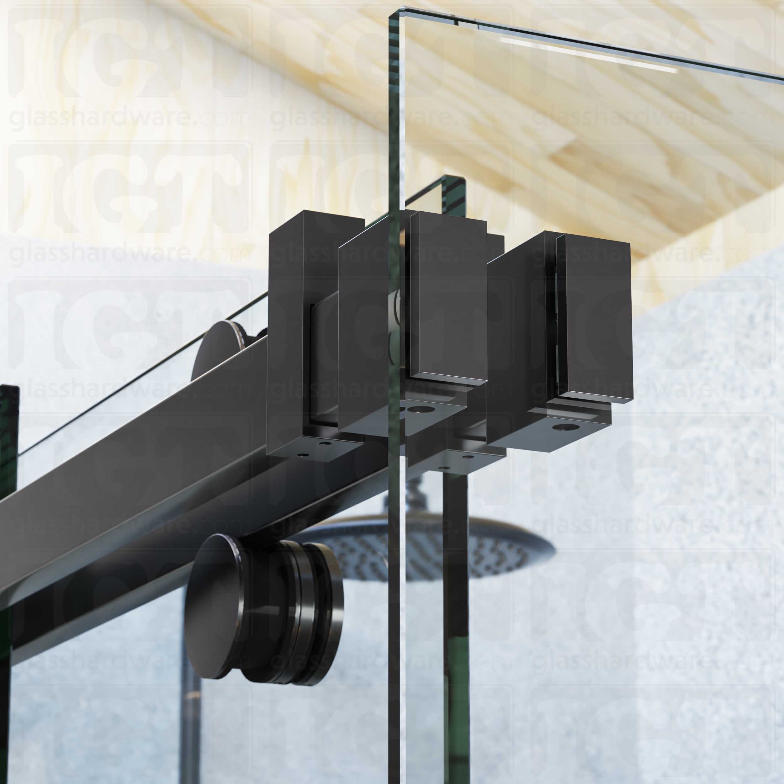 A close up view of the 90 Degree Connectors fixed to the return panel and joined to the sliding door system's track. Polished Gun Metal.