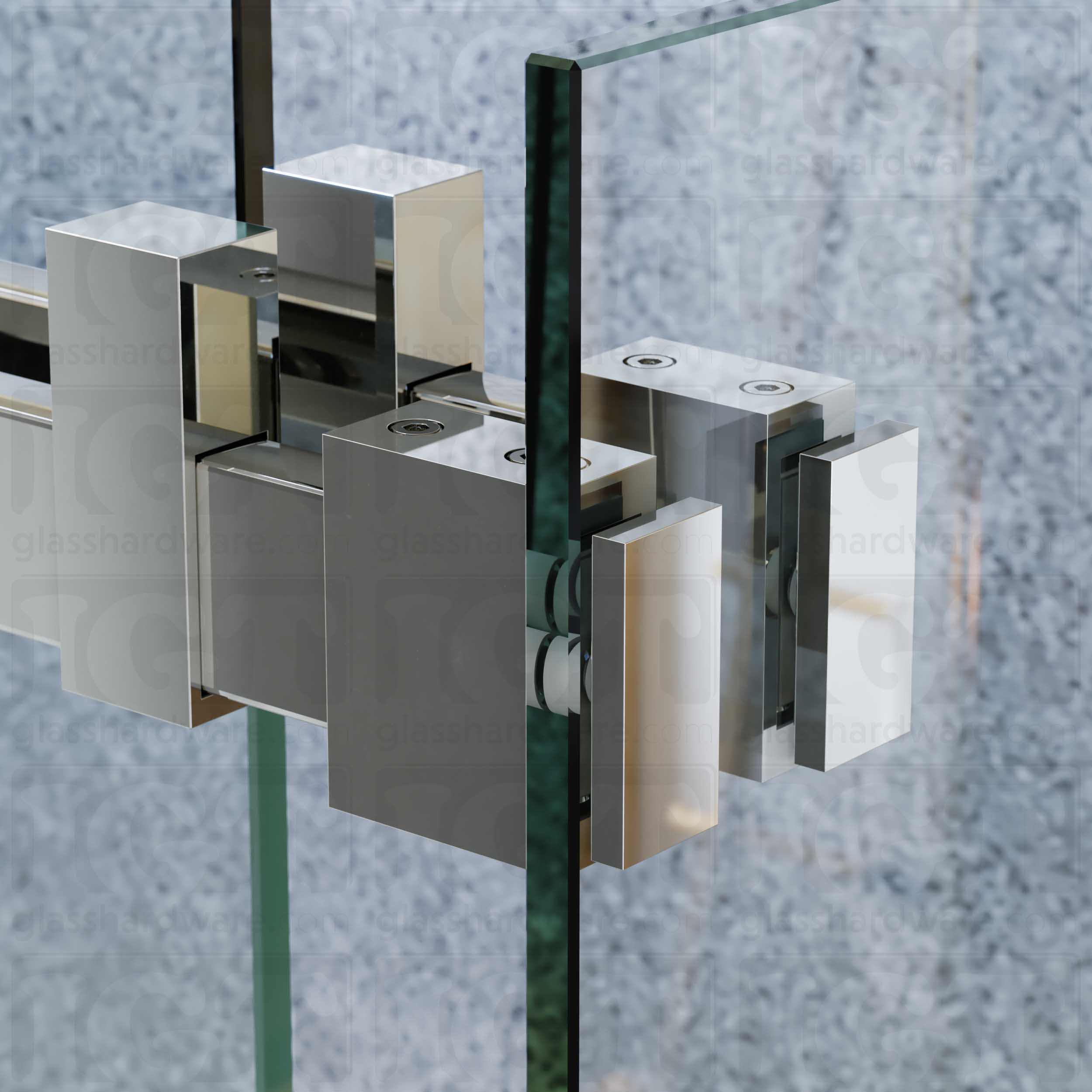 A close up view of the 90 Degree Connectors fixed to the return panel and joined to the sliding door system's track. Polished Stainless.