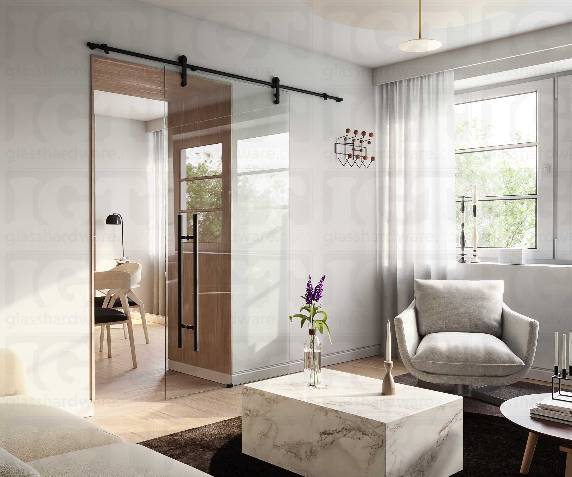 A modern living room featuring a glass barn door installed with four Wall Mount Brackets. Matte Black.