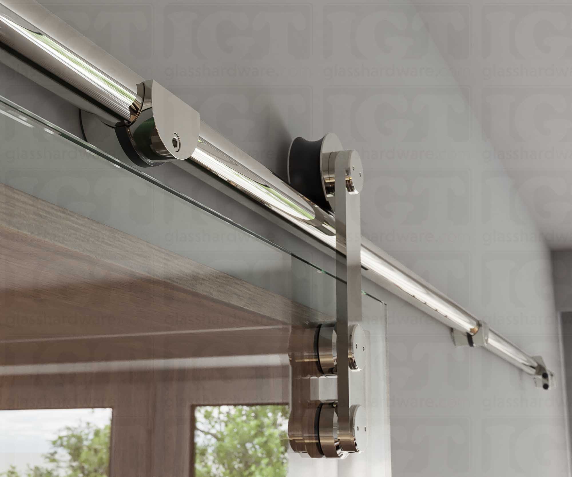 A close up of the Wall Mount Bracket, tightened to securely hold the barn door's upper track. Polished Stainless.