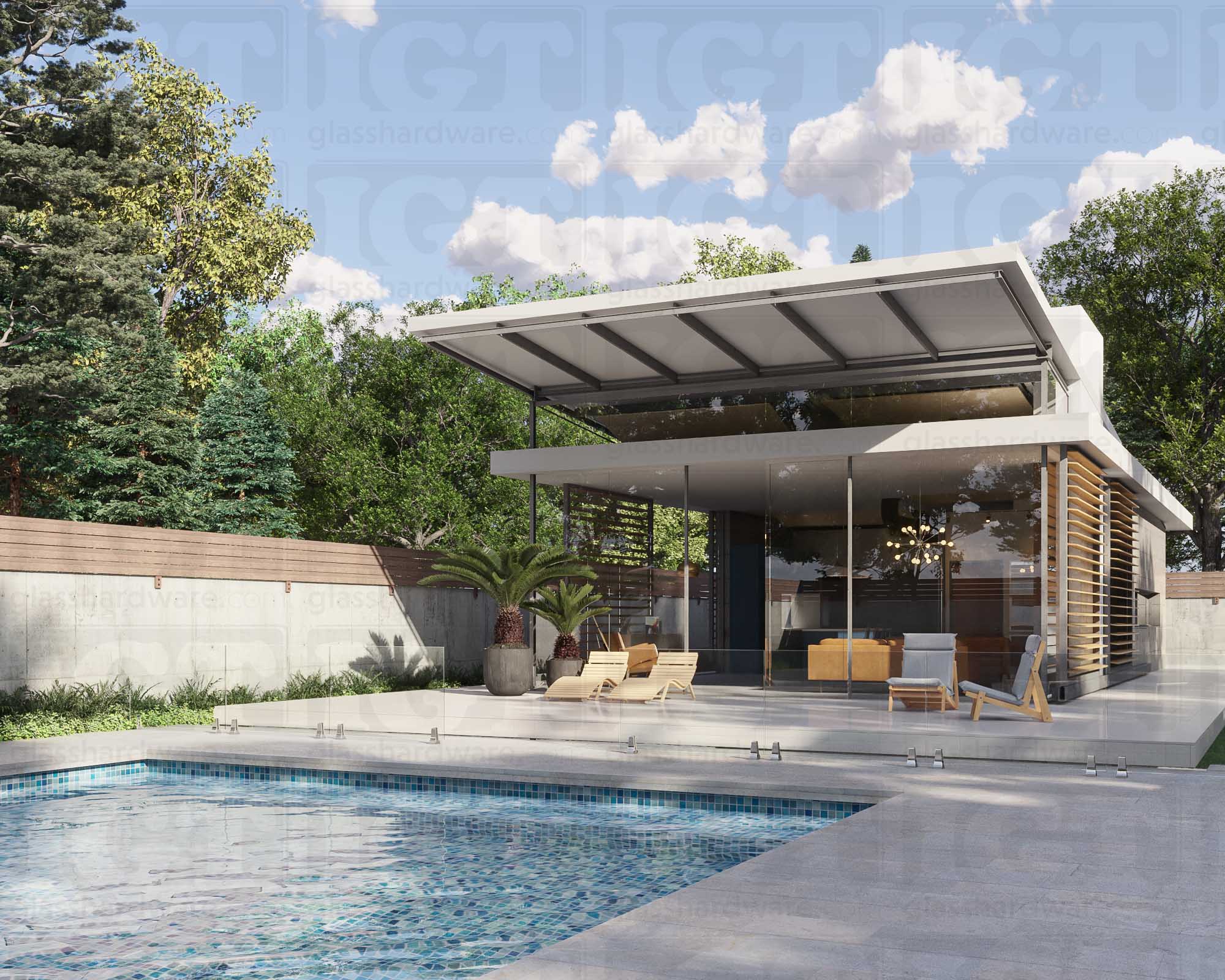 An outdoor poolside area featuring glass railing supported by 316L Stainless Steel Chameleon Spigots. Polished Stainless.