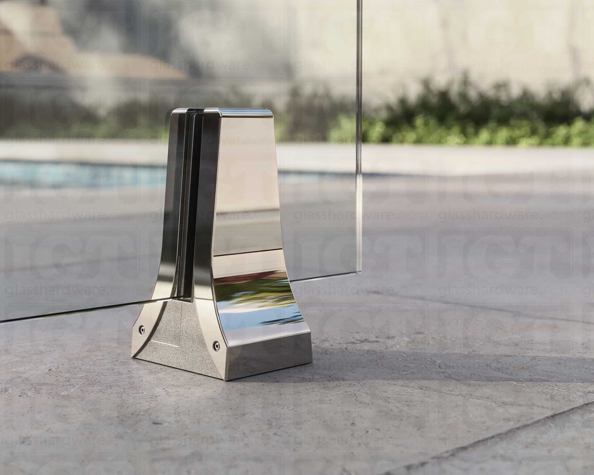 A close up of the 316L Stainless Steel Chameleon Spigot supporting a glass railing system. Polished Stainless.