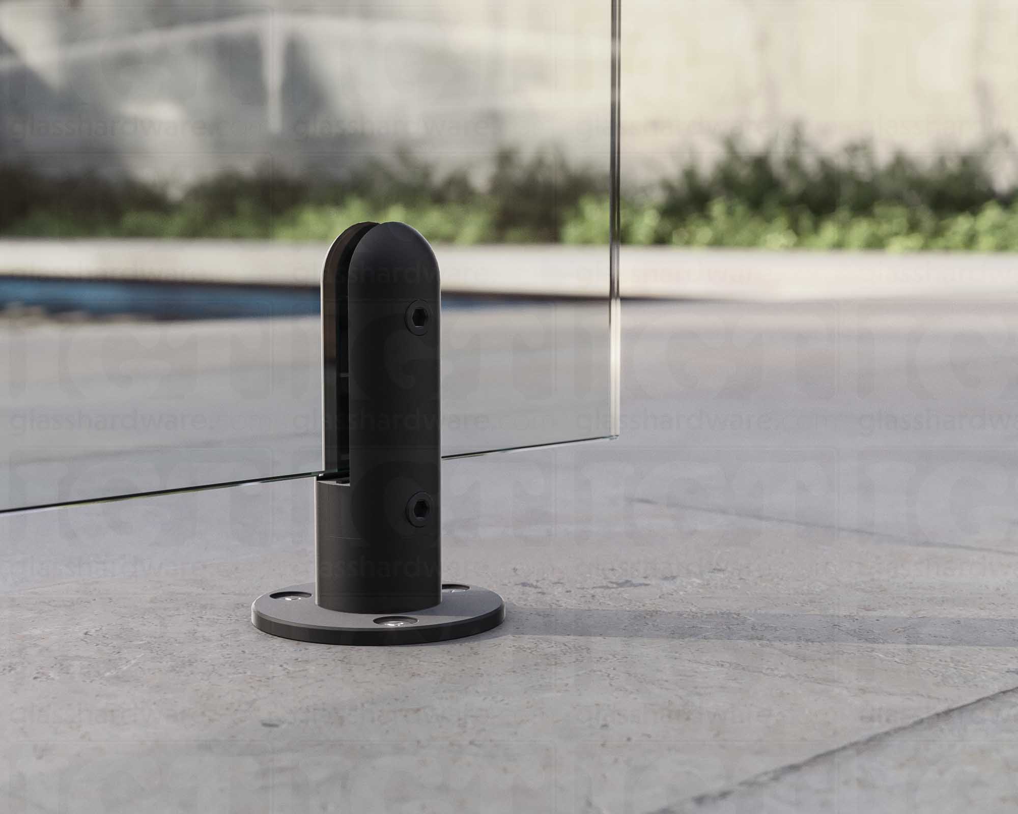 A close up of the 316L Stainless Steel Round Spigot supporting a glass railing system. Matte Black.