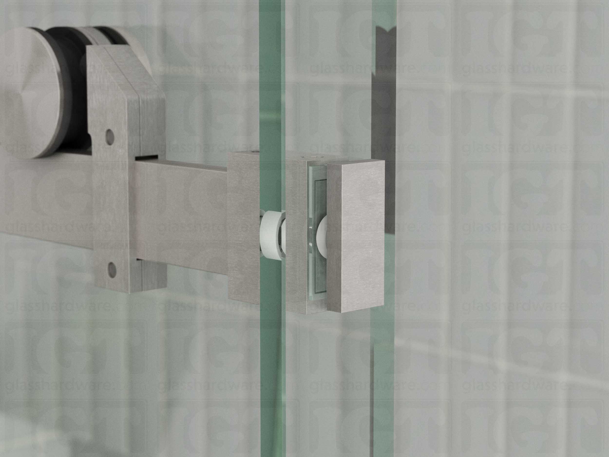 A close up view of the 90 Degree Connector installed on a sliding shower door system. Brushed Stainless.
