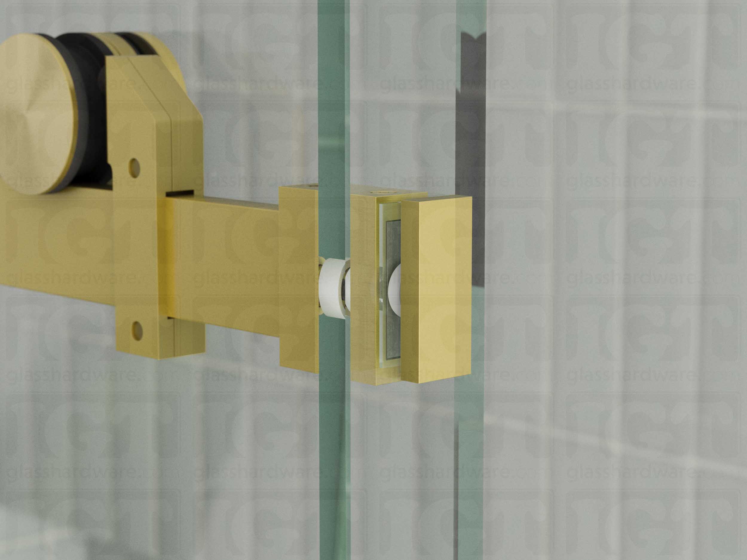 A close up view of the 90 Degree Connector installed on a sliding shower door system. Gold Brushed.