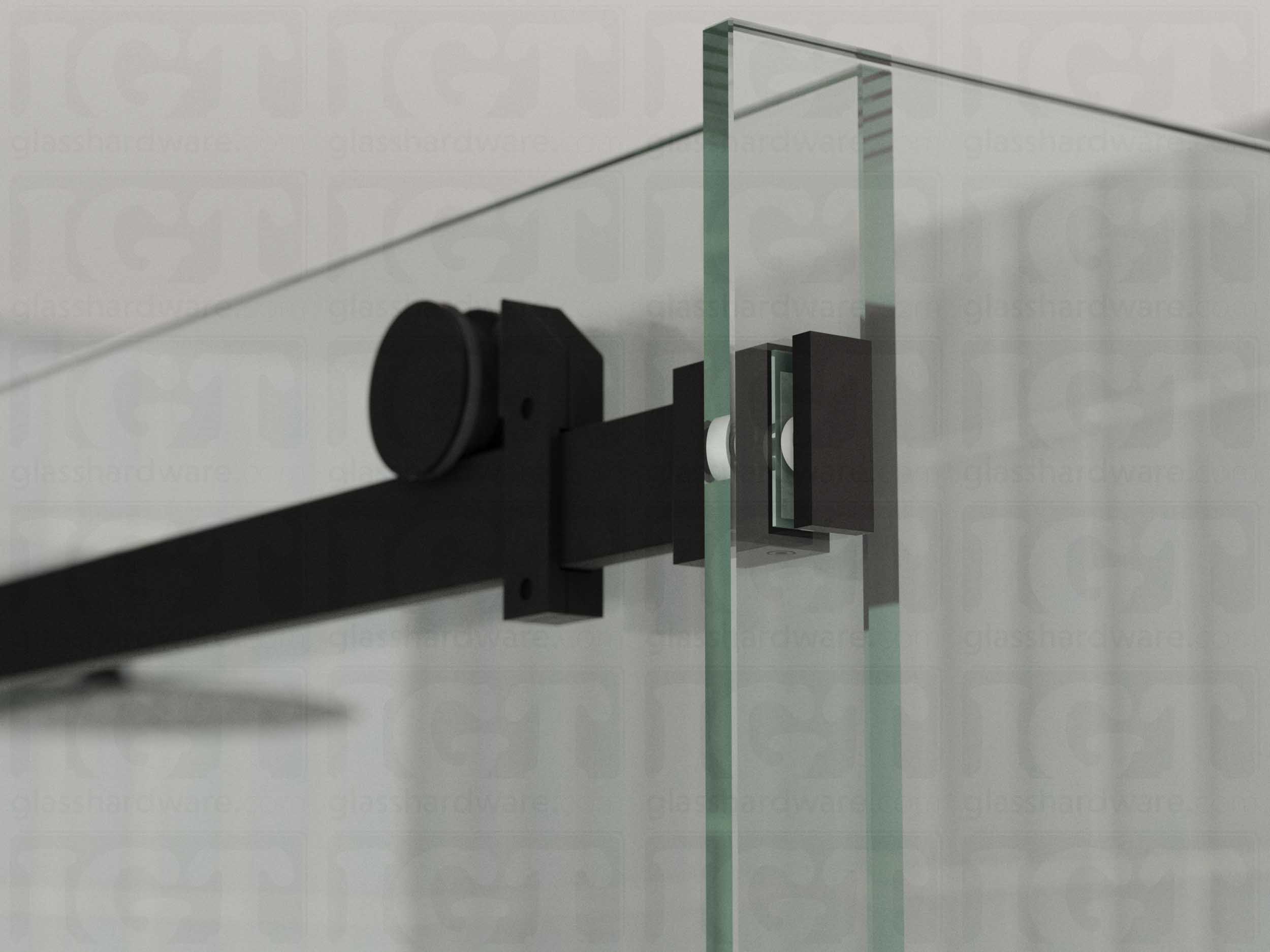 A close up view of the 90 Degree Connector fixed to the return panel and joined to the sliding door system's track. Matte Black.