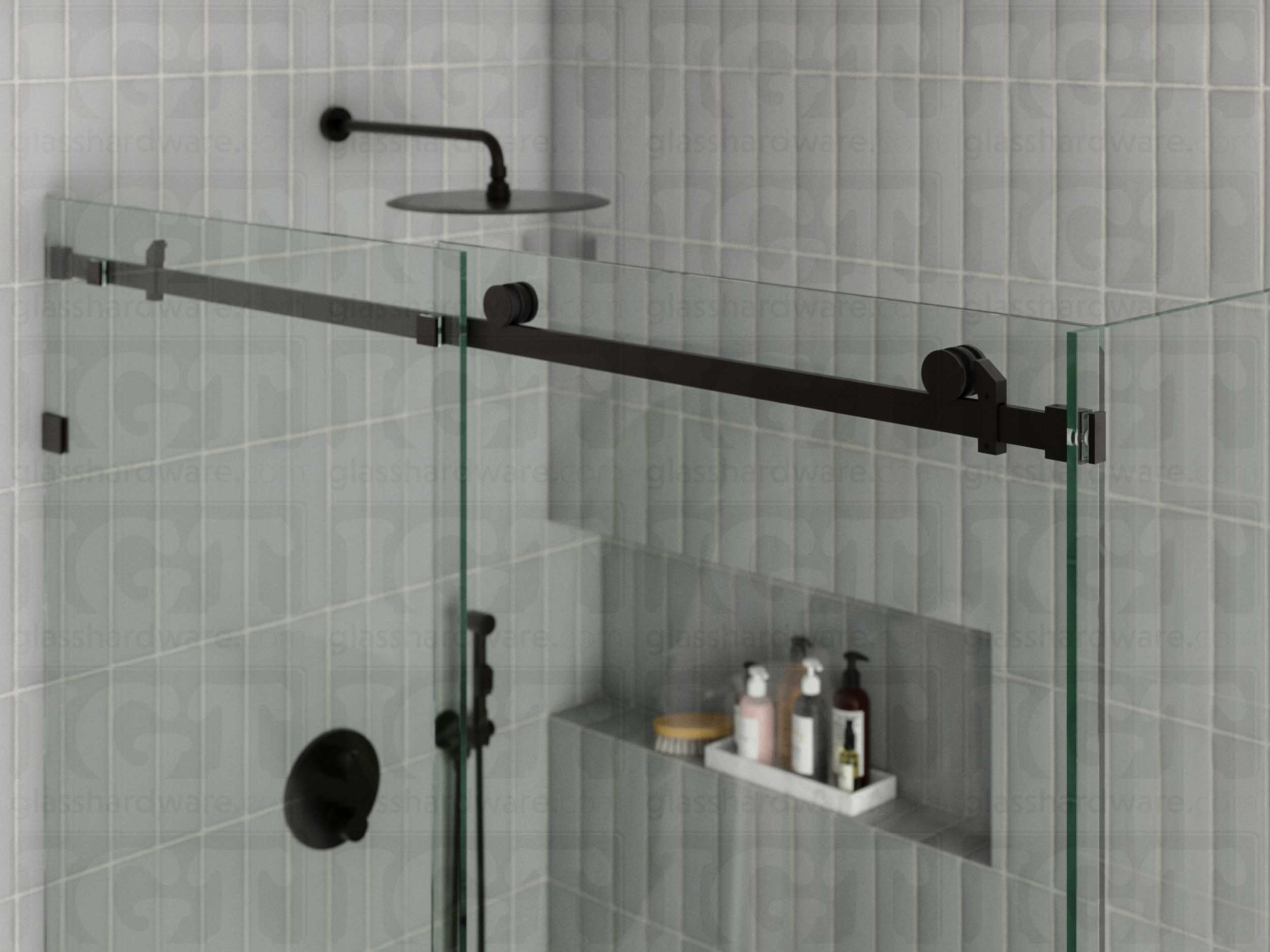 A close-up view of the sliding door system's hardware, featuring the 90 Degree Connector securing a return panel. Oil Rubbed Bronze.