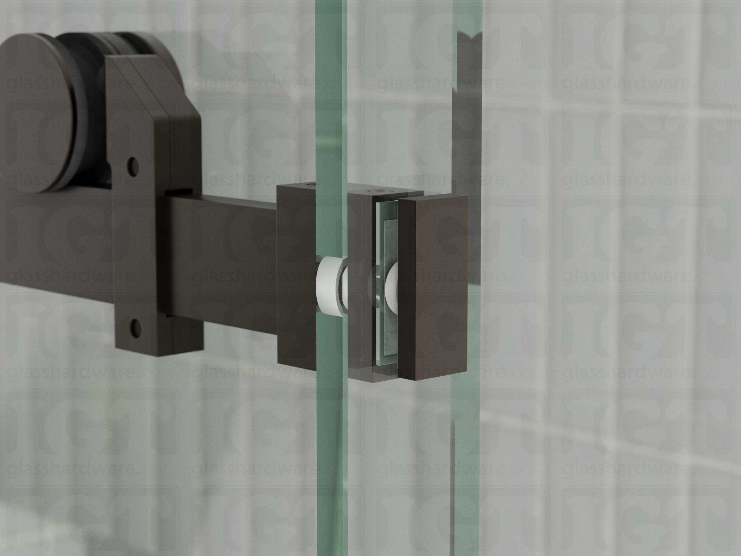 A close up view of the 90 Degree Connector installed on a sliding shower door system. Oil Rubbed Bronze.