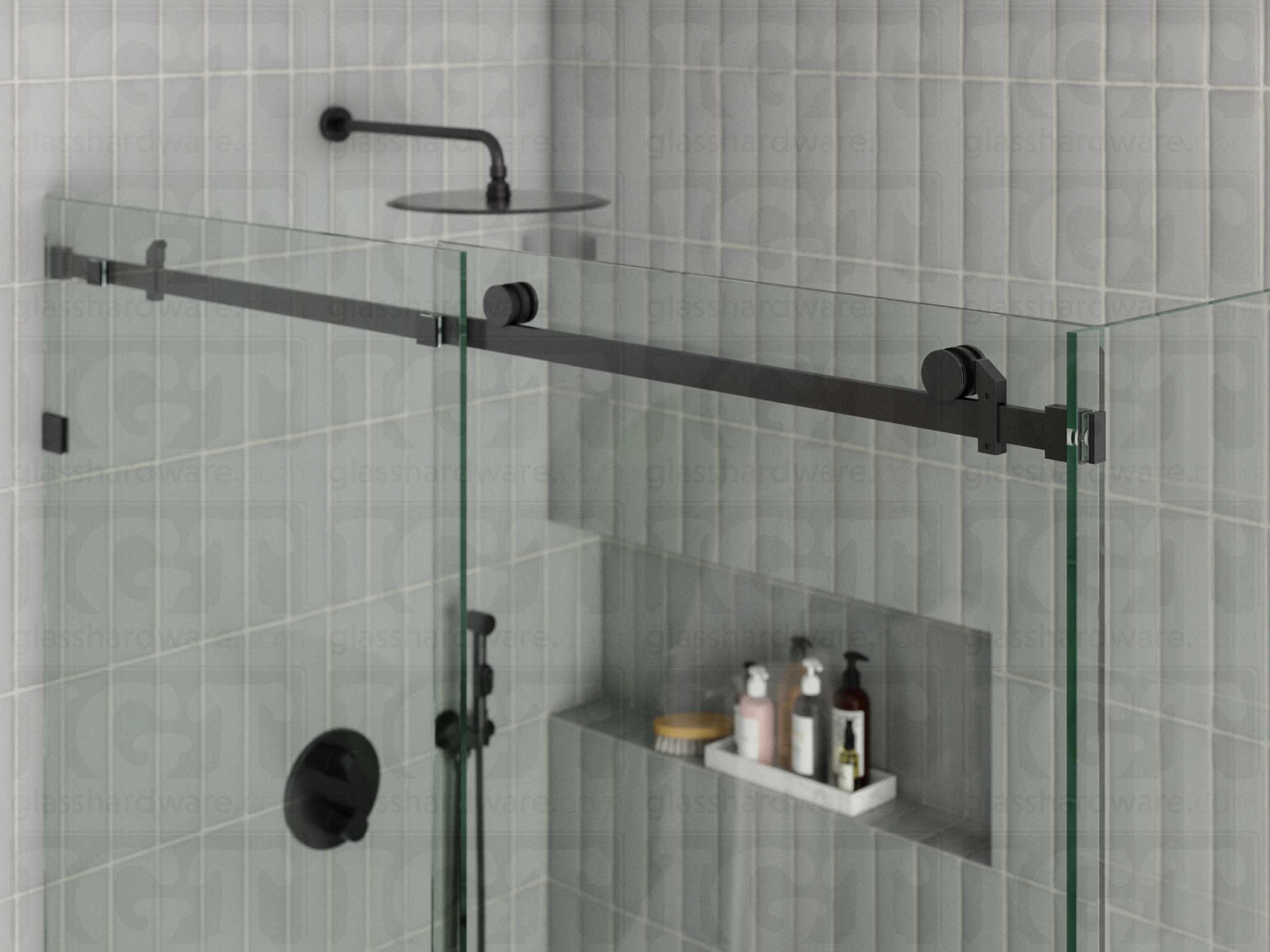 A close-up view of the sliding door system's hardware, featuring the 90 Degree Connector securing a return panel. Polished Gun Metal.