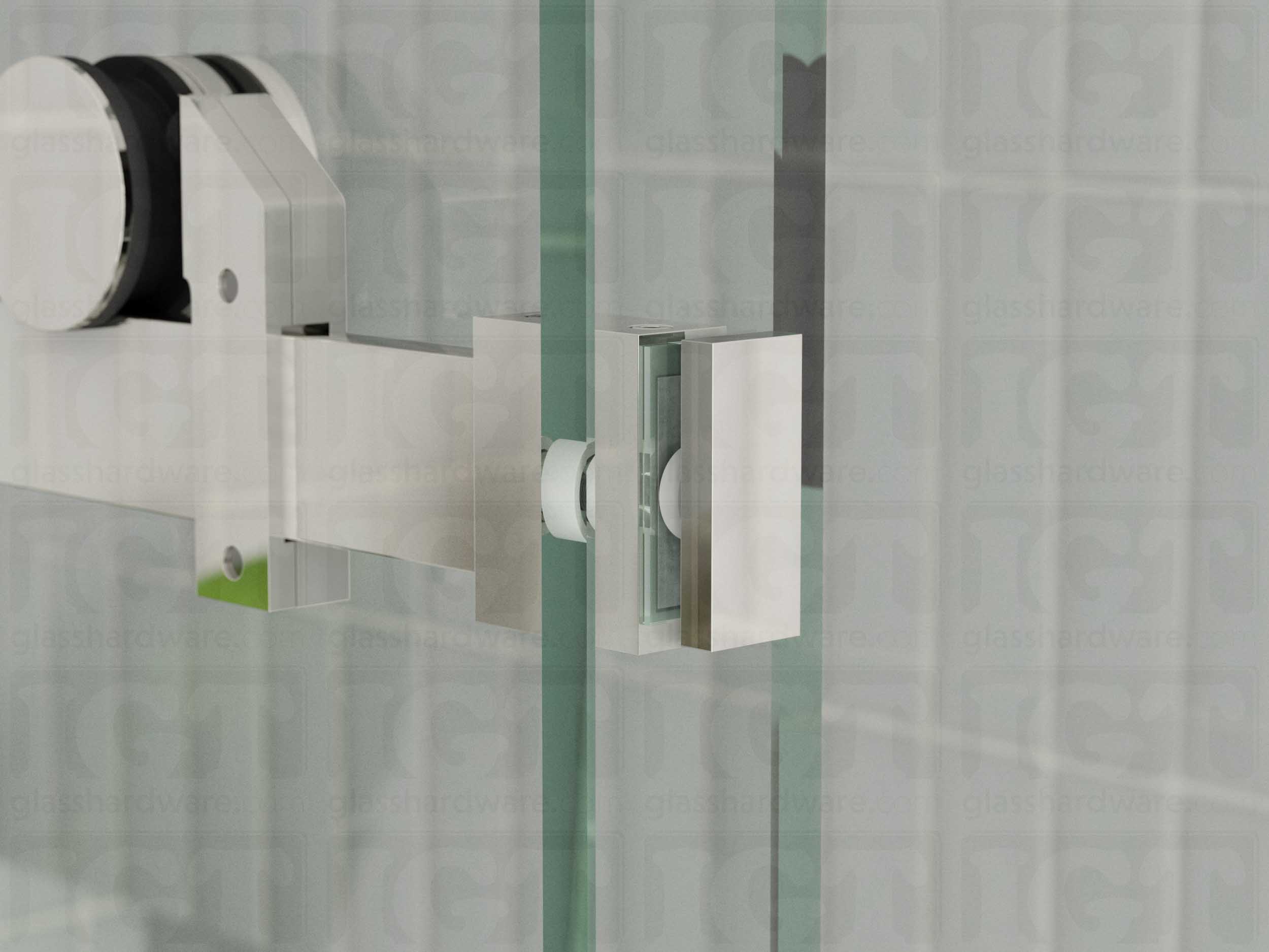 A close up view of the 90 Degree Connector installed on a sliding shower door system. Polished Stainless.