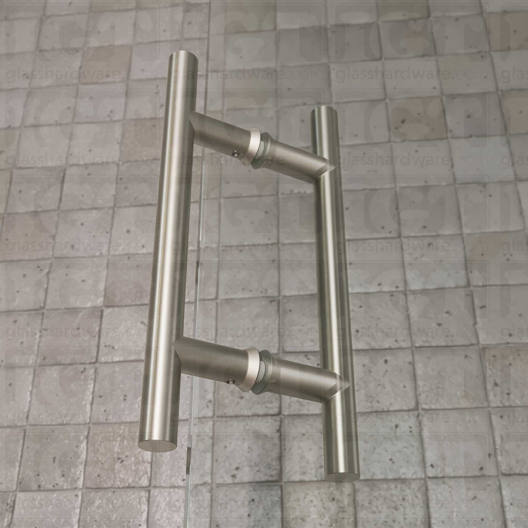 A close-up of the 6" Center-to-Center Round Ladder Handle installed on a glass shower door, showcasing its slim ladder style design. Brushed Nickel.