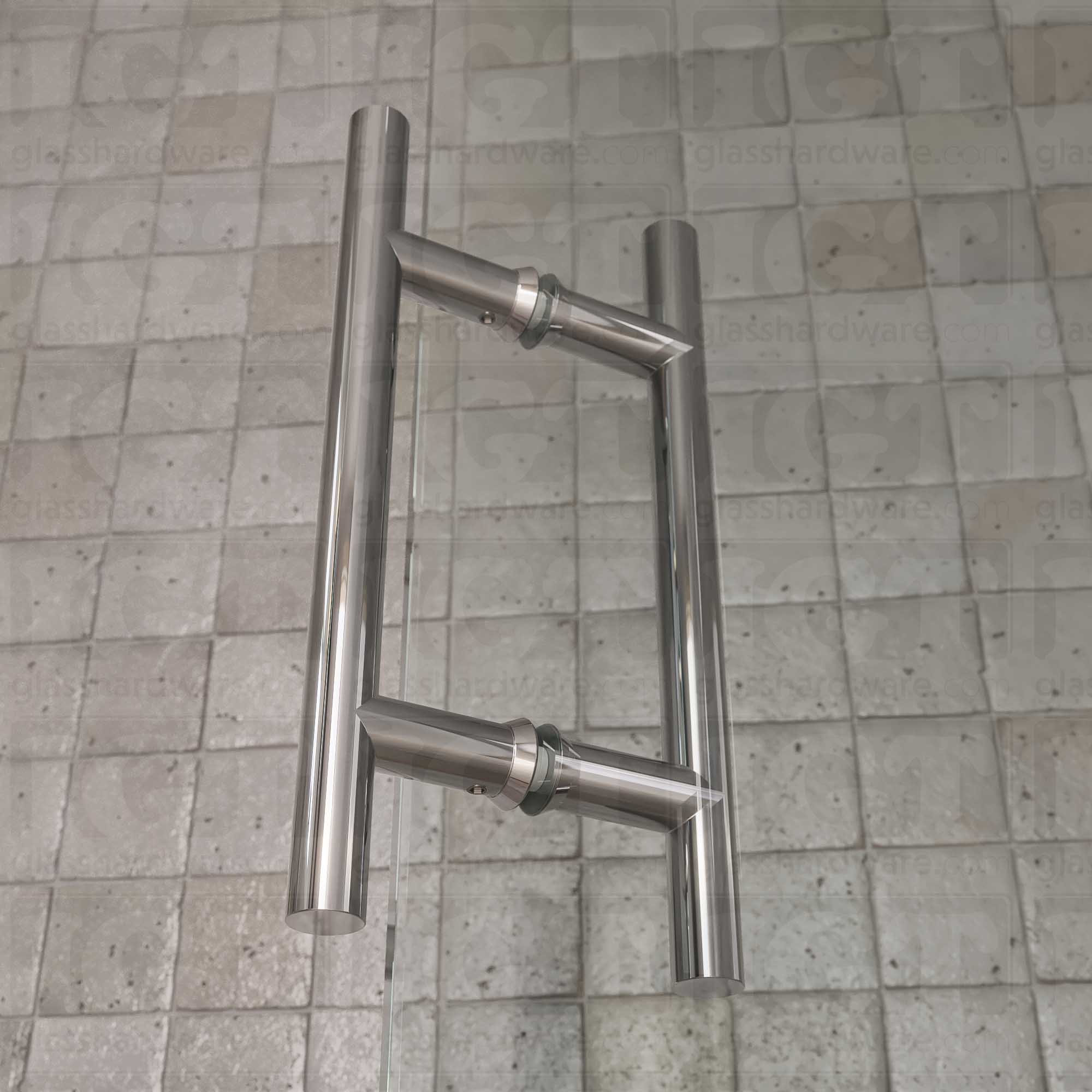 A close-up of the 6" Center-to-Center Round Ladder Handle installed on a glass shower door, showcasing its slim ladder style design. Chrome Polished.