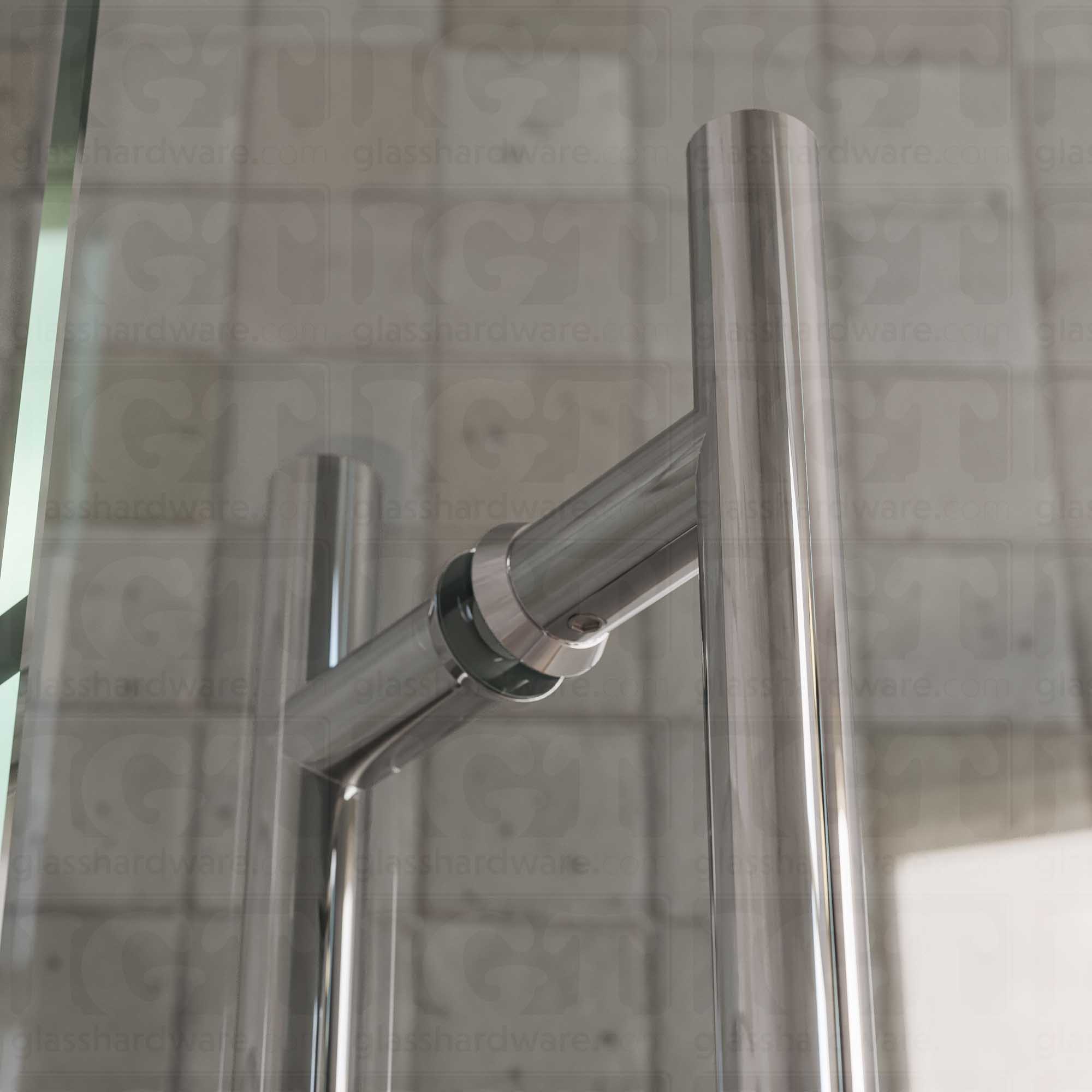 A close-up of the 6" Center-to-Center Round Ladder Handle installed on a glass shower door, showing its 304 Stainless Steel construction in more detail. Chrome Polished.