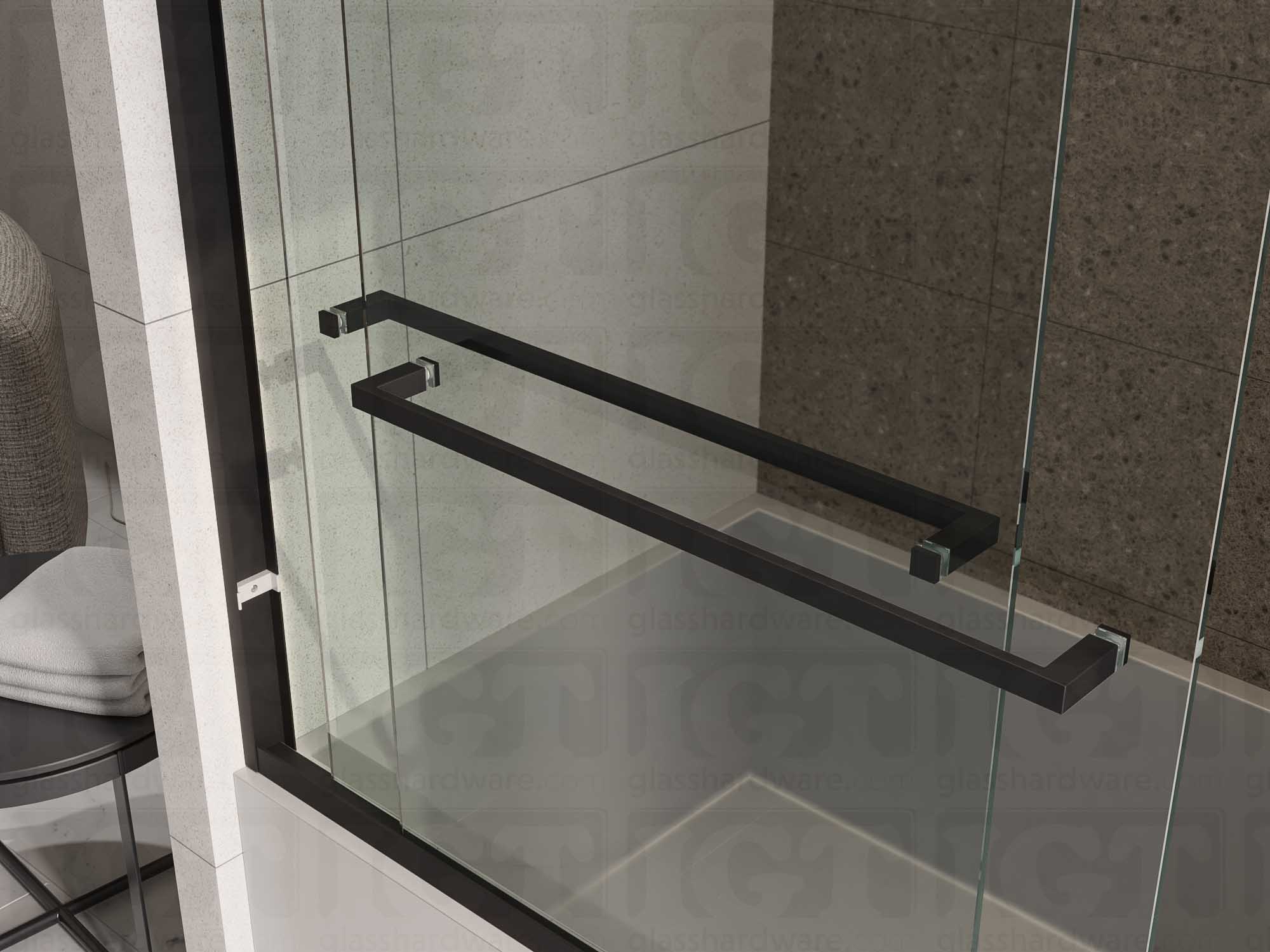 Two 24" Slim Single-Sided Square Towel Bars installed on a bypass sliding door system, one for each glass panel. Matte Black.